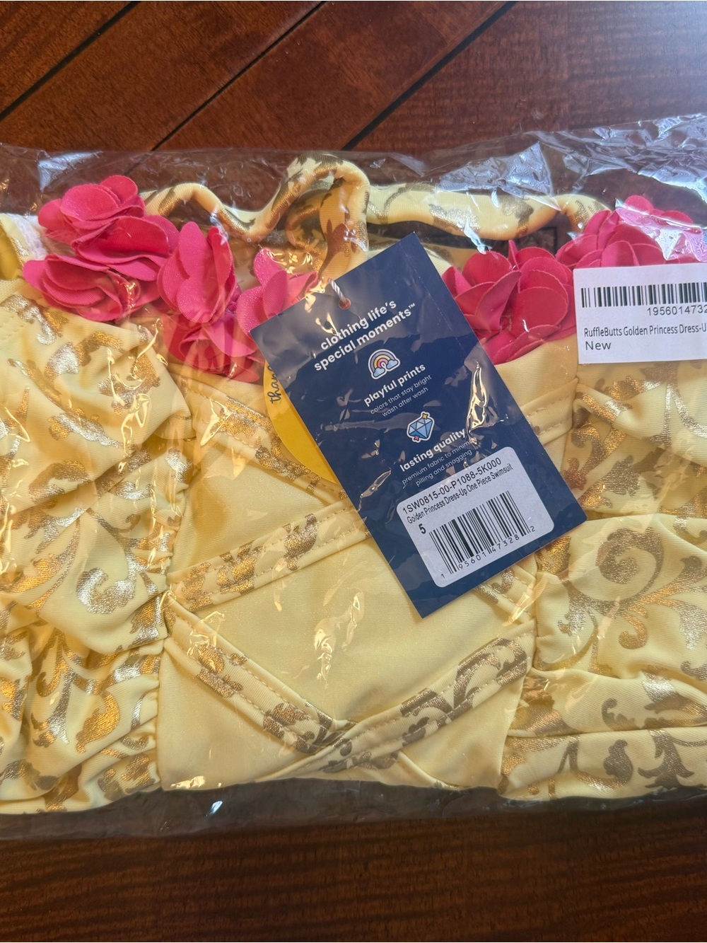 Yellow and Gold Girls' Ruffled Bathing Suit with Pink Flower Trim